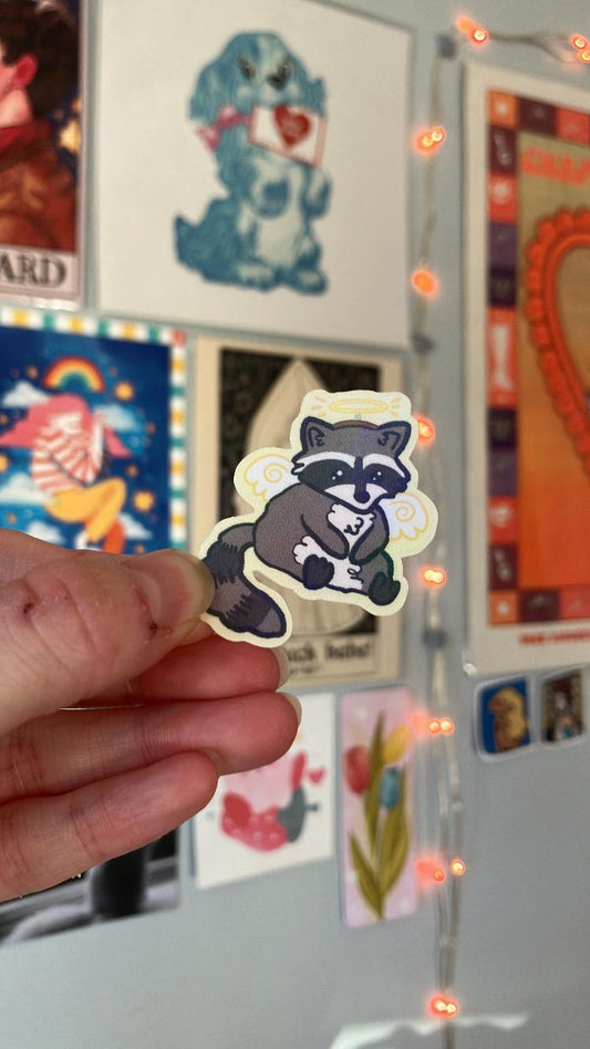 Angel raccoon holographic sticker